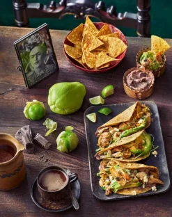Frida Kahlo - Dinner at Frida's: 90 Authentic Mexican Recipes Inspired by the Life and Art of Frida Kahlo Hardcover Book